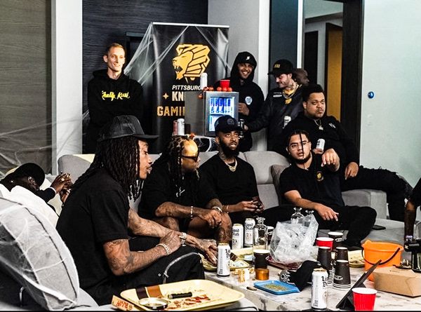 Wiz Khalifa group portrait at a live event